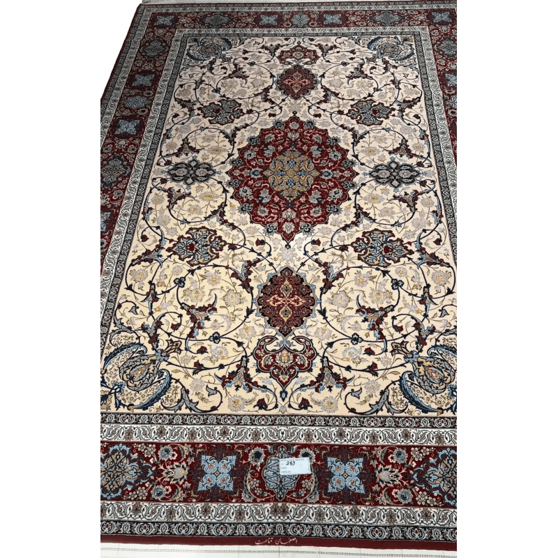 Handcrafted Ghenaat Isfahan rug with intricate floral patterns