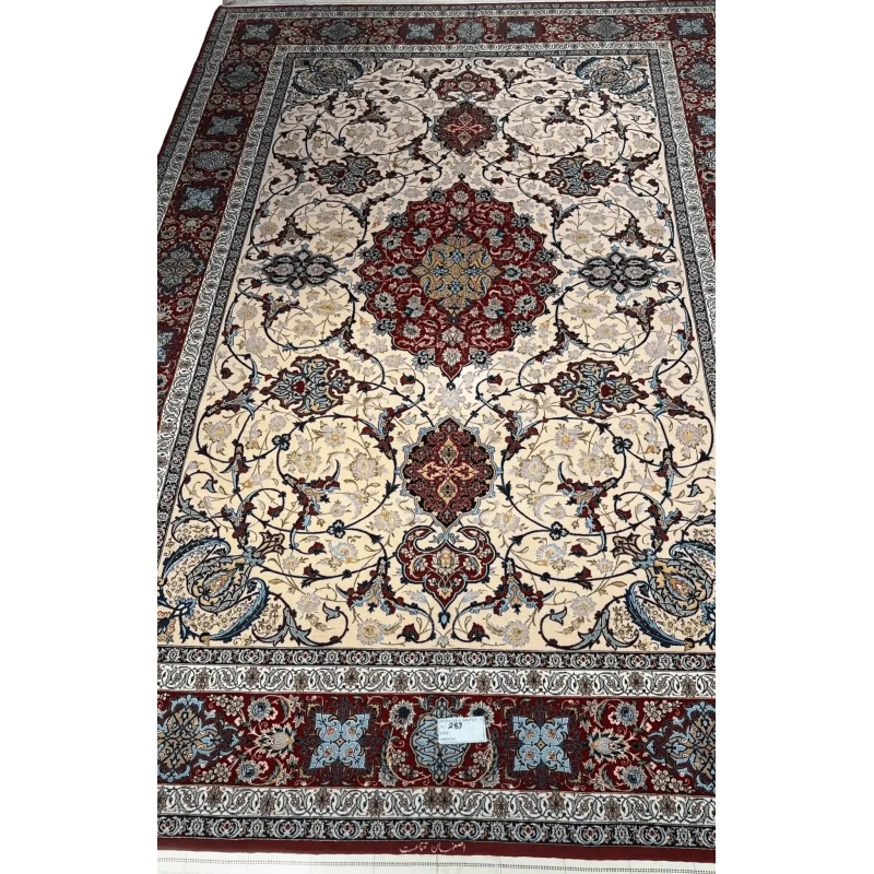 Handcrafted Ghenaat Isfahan rug with intricate floral patterns