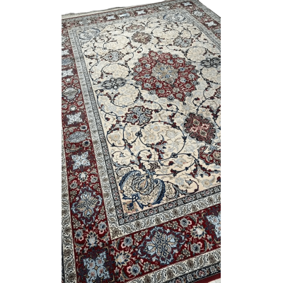 Ghenaat's Isfahan rug featuring a prominent central medallion design