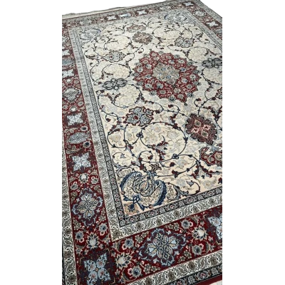 Ghenaat's Isfahan rug featuring a prominent central medallion design