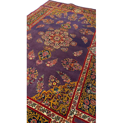 The Elegant Mashad Rug displayed in a room setting to give an idea of its size and design