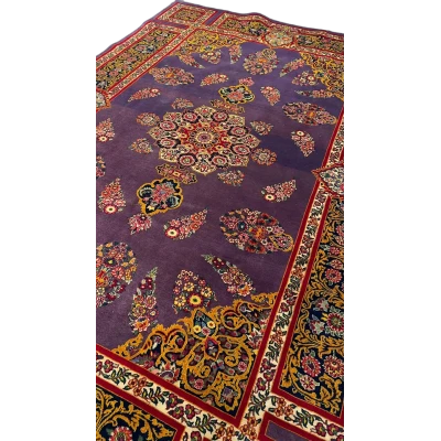 The Elegant Mashad Rug displayed in a room setting to give an idea of its size and design