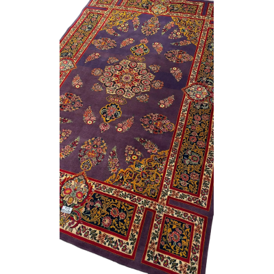 Detailed image of the Elegant Mashad Rug highlighting its ornate purple patterns