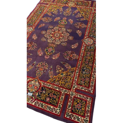 Detailed image of the Elegant Mashad Rug highlighting its ornate purple patterns