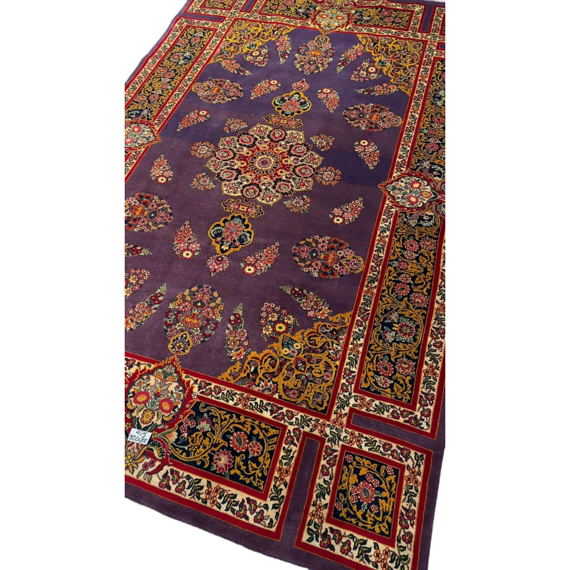 Detailed image of the Elegant Mashad Rug highlighting its ornate purple patterns