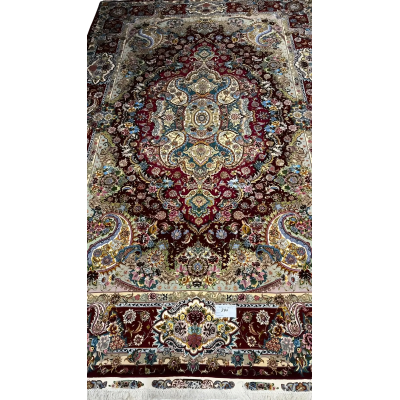 Elegant Tabriz rug showcasing traditional handwoven artistry for interior design