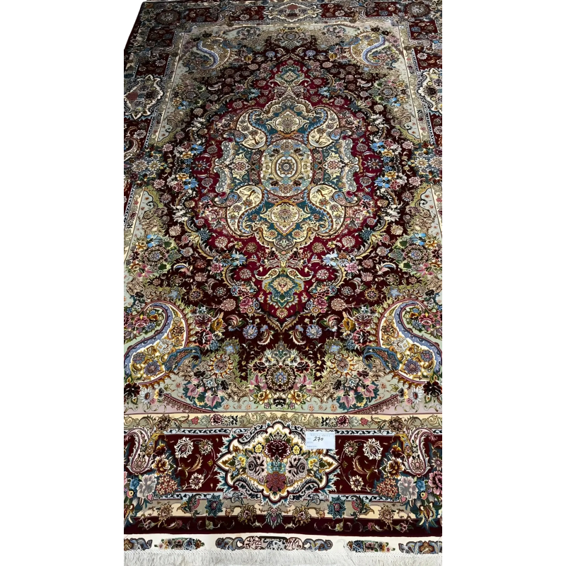 Elegant Tabriz rug showcasing traditional handwoven artistry for interior design