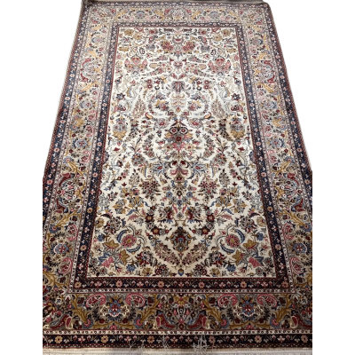 The entire spread of the semi antique full silk Kashan rug showcasing its timeless design