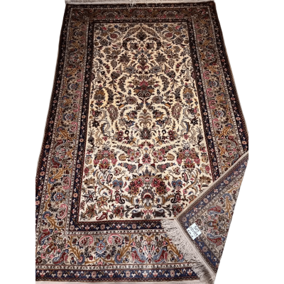 Full silk Kashan rug with intricate floral patterns and rich colors
