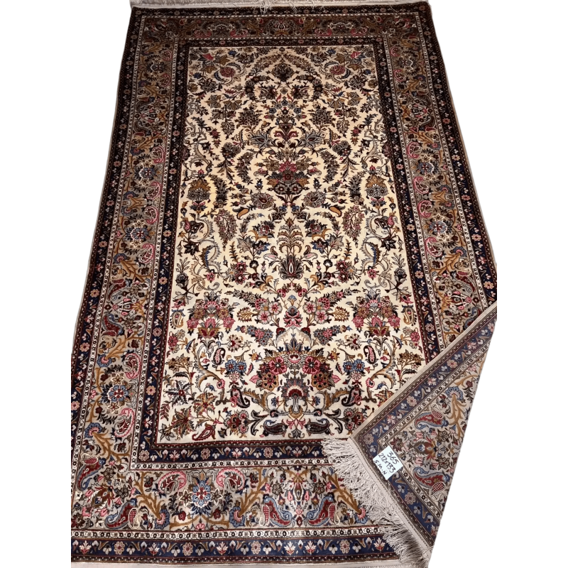 Full silk Kashan rug with intricate floral patterns and rich colors