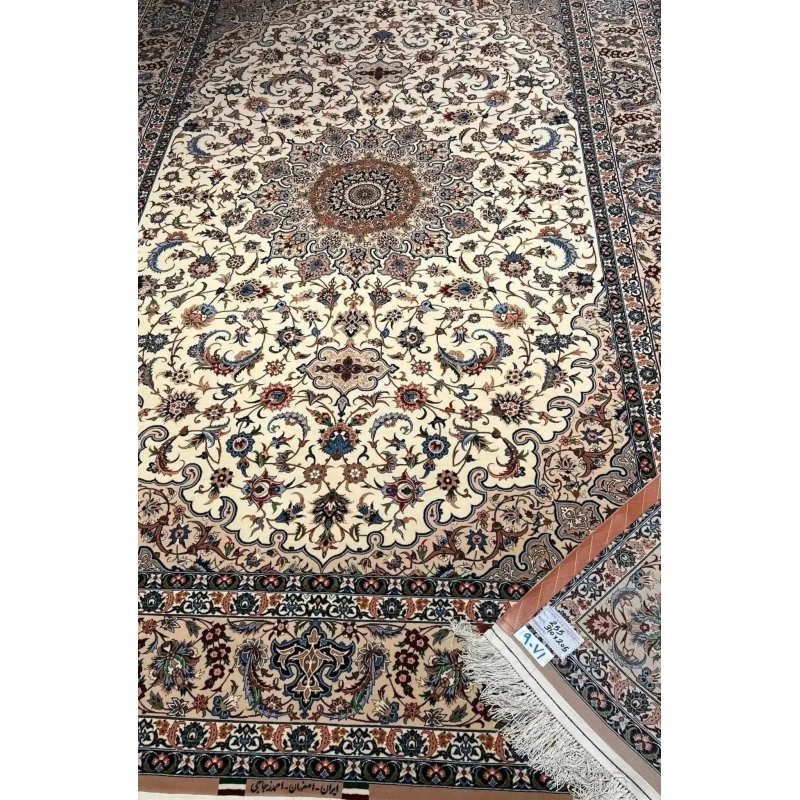 "Luxurious Persian rug from Isfahan, Iran, hand-knotted by Ahmad Zojaji. This large 300 cm x 200 cm (9.8 feet x 6.5 feet) rug features a high knot density of 810,000 knots per square meter and is crafted with a wool and silk pile. The silk warp and traditional design make this new rug a true statement piece."