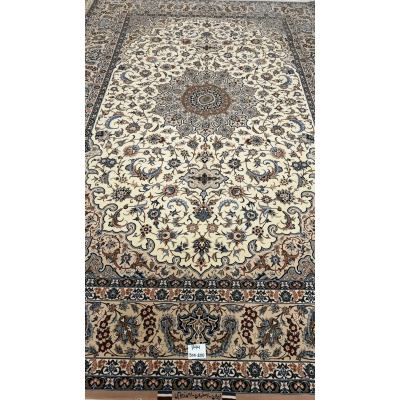 "Hand-knotted Isfahan Persian rug by master weaver Ahmad Zojaji. Measuring 300 cm x 200 cm (approximately 9.8 feet x 6.5 feet) with a knot density of 810,000 knots per square meter, this luxurious rug is crafted with a wool and silk pile and a silk warp. The intricate floral medallion design in soft tones is a stunning new creation from Isfahan, Iran, with one available in stock."