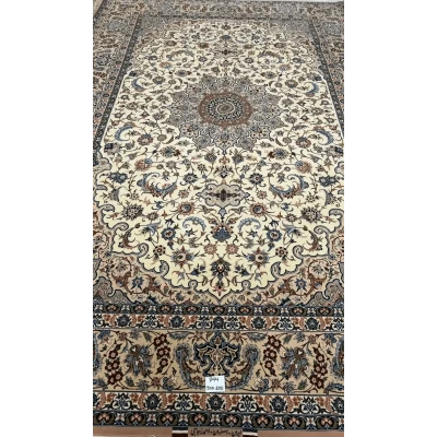 "Hand-knotted Isfahan Persian rug by master weaver Ahmad Zojaji. Measuring 300 cm x 200 cm (approximately 9.8 feet x 6.5 feet) with a knot density of 810,000 knots per square meter, this luxurious rug is crafted with a wool and silk pile and a silk warp. The intricate floral medallion design in soft tones is a stunning new creation from Isfahan, Iran, with one available in stock."