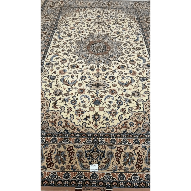 "Hand-knotted Isfahan Persian rug by master weaver Ahmad Zojaji. Measuring 300 cm x 200 cm (approximately 9.8 feet x 6.5 feet) with a knot density of 810,000 knots per square meter, this luxurious rug is crafted with a wool and silk pile and a silk warp. The intricate floral medallion design in soft tones is a stunning new creation from Isfahan, Iran, with one available in stock."