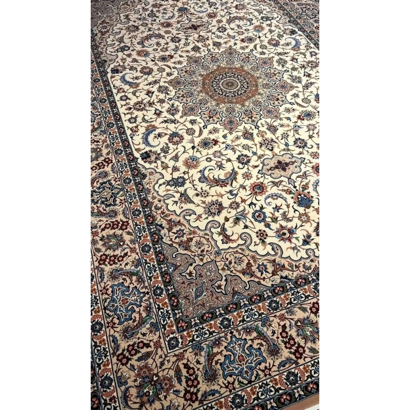 "Exquisite Isfahan Persian rug, crafted by master weaver Ahmad Zojaji. This 300 cm x 200 cm (9.8 x 6.5 feet) rug features a hand-knotted wool and silk pile with a silk warp. The intricate design has a knot density of 810,000 knots per square meter, making this new rug from Isfahan an elegant, one-of-a-kind piece. Limited stock available."
