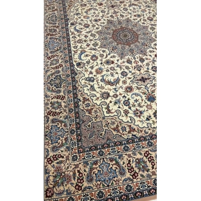 "Isfahan Persian rug by Ahmad Zojaji, knotted by hand with a wool and silk pile and silk warp. This large rug measures 300 cm x 200 cm (9.8 feet x 6.5 feet) and has a knot density of 810,000 knots per square meter. A beautiful floral design, this new rug from Iran offers both elegance and craftsmanship, with only one available in stock."