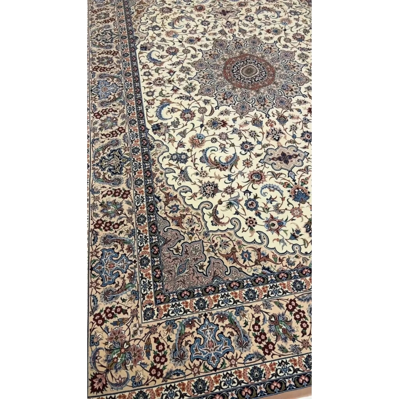 "Isfahan Persian rug by Ahmad Zojaji, knotted by hand with a wool and silk pile and silk warp. This large rug measures 300 cm x 200 cm (9.8 feet x 6.5 feet) and has a knot density of 810,000 knots per square meter. A beautiful floral design, this new rug from Iran offers both elegance and craftsmanship, with only one available in stock."