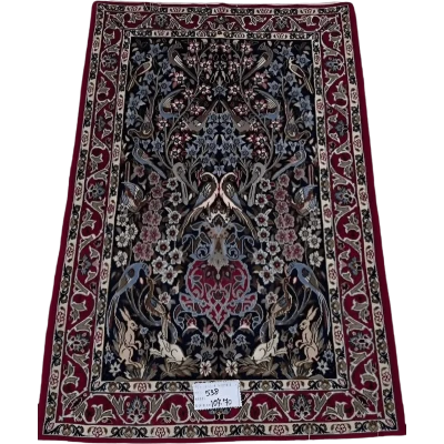  "Hand-knotted Persian rug from Isfahan, made with wool and silk. This luxury rug measures approximately 107 cm x 70 cm (3.5 x 2.3 feet) and features intricate floral and bird designs with a knot density of 810,000 knots per square meter. Perfect for adding sophistication to living spaces."
