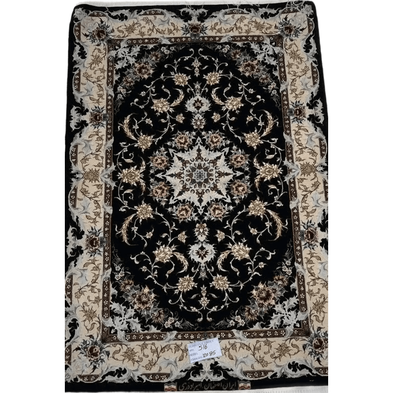 "Authentic Iranian carpet with intricate floral design in black, handwoven by Amir Buzarie"