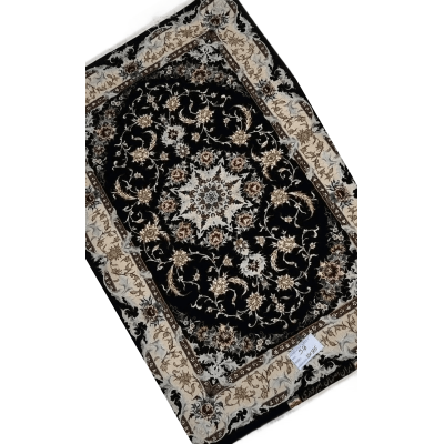 "Close-up of traditional Persian carpet from Isfahan, with fine silk and wool pile"