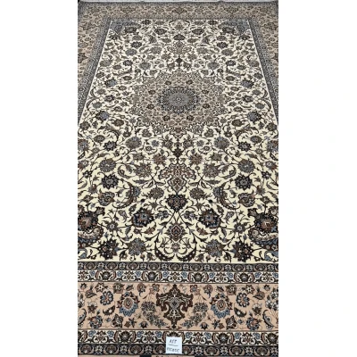 Luxurious Persian carpet knotted by hand in Isfahan, featuring an intricate floral medallion pattern, with a knot density of 810,000 per m².