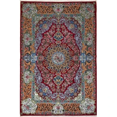 Hand-knotted Isfahan Persian carpet with intricate floral design in wool and silk
