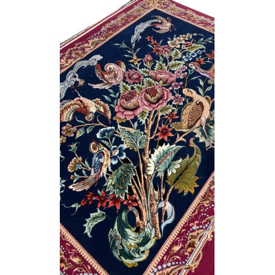 "Authentic Persian rug from Isfahan, Iran, crafted with wool and silk. This small area rug showcases detailed bird and floral patterns, ideal for collectors of Persian hand-knotted rugs."