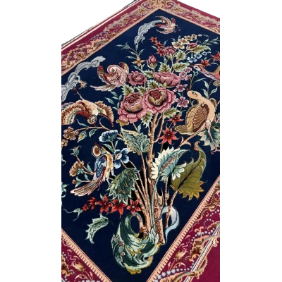"Authentic Persian rug from Isfahan, Iran, crafted with wool and silk. This small area rug showcases detailed bird and floral patterns, ideal for collectors of Persian hand-knotted rugs."
