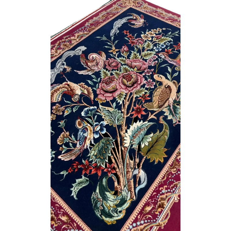 "Authentic Persian rug from Isfahan, Iran, crafted with wool and silk. This small area rug showcases detailed bird and floral patterns, ideal for collectors of Persian hand-knotted rugs."