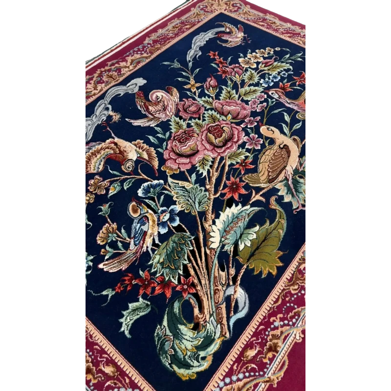 "Authentic Persian rug from Isfahan, Iran, crafted with wool and silk. This small area rug showcases detailed bird and floral patterns, ideal for collectors of Persian hand-knotted rugs."