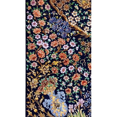 Persian rug featuring a Tree of Life pattern with gold and blue floral accents on a black field