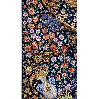 Persian rug featuring a Tree of Life pattern with gold and blue floral accents on a black field