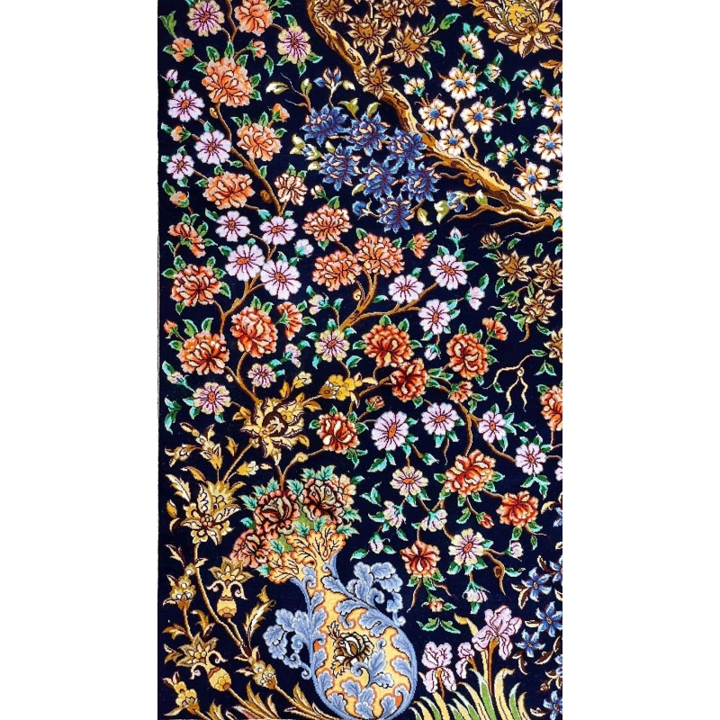 Persian rug featuring a Tree of Life pattern with gold and blue floral accents on a black field