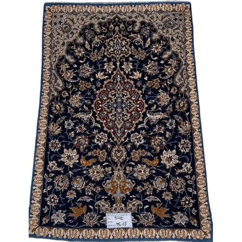 "Small vintage Persian carpet, hand-knotted in Isfahan, Iran, measuring 95 cm x 63 cm (3.1 x 2.1 feet). Made with wool and silk, this 70-year-old rug is in great condition, featuring intricate designs that reflect its rich heritage."