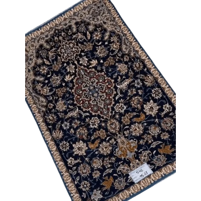 "Antique Persian carpet from Isfahan, Iran, handcrafted with wool and silk. The rug measures 95 cm x 63 cm (3.1 x 2.1 feet) and has a knot density of 1,000,000 knots per square meter. A 70-year-old vintage piece with intricate detailing."