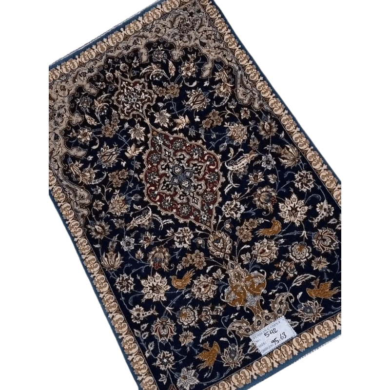 "Antique Persian carpet from Isfahan, Iran, handcrafted with wool and silk. The rug measures 95 cm x 63 cm (3.1 x 2.1 feet) and has a knot density of 1,000,000 knots per square meter. A 70-year-old vintage piece with intricate detailing."
