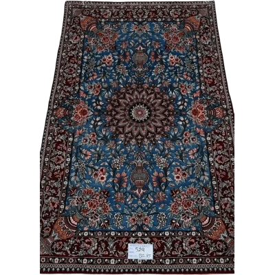 "Unique Isfahan rug handcrafted from wool and silk, featuring intricate Persian designs. This luxury rug measures approximately 130 cm x 85 cm (4.2 feet x 2.8 feet) with a knot density of 810,000 knots per square meter. The rug is new, made in Isfahan, Iran, and knotted by hand with a silk warp and wool-silk pile, making it a perfect addition to luxury home decor."