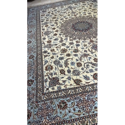 "Vintage Persian Rug, Handwoven in Isfahan, Iran – Masterpiece of Silk and Wool" – Highlighting the vintage nature and materials.