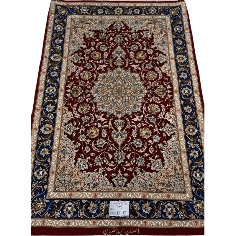 Hand-knotted dark red Persian rug with intricate floral patterns, crafted in Isfahan using wool and silk, designed by master weaver Hamid Atrian.