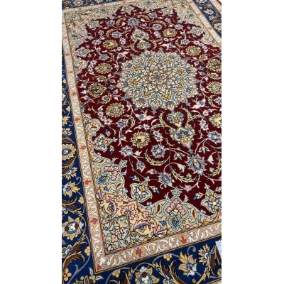 Luxury Isfahan Persian rug featuring a rich dark red color, made with a blend of wool and silk, hand-knotted with exceptional craftsmanship.