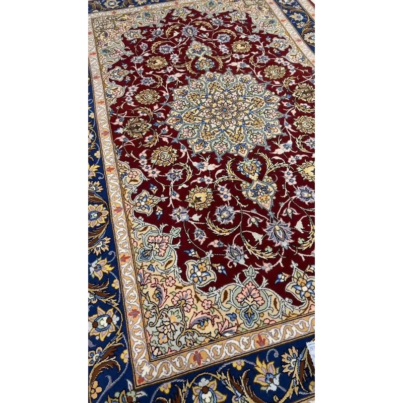 Luxury Isfahan Persian rug featuring a rich dark red color, made with a blend of wool and silk, hand-knotted with exceptional craftsmanship.