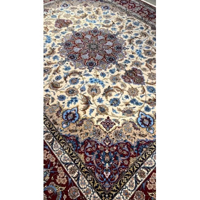 "Detailed floral patterns on wool and silk Persian rug"