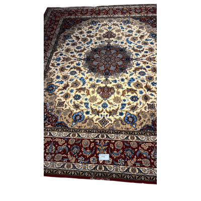"Hand-knotted Persian rug with vibrant red and blue colors"