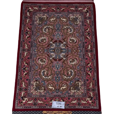 "Hand-knotted Persian rug from Isfahan, 95x65 cm, crafted by Mirzaie with wool and silk, featuring intricate designs and high knot density (810,000 knots/m²). Authentic Persian craftsmanship."