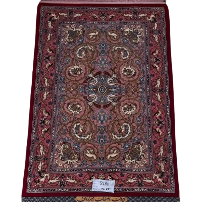 "Hand-knotted Persian rug from Isfahan, 95x65 cm, crafted by Mirzaie with wool and silk, featuring intricate designs and high knot density (810,000 knots/m²). Authentic Persian craftsmanship."