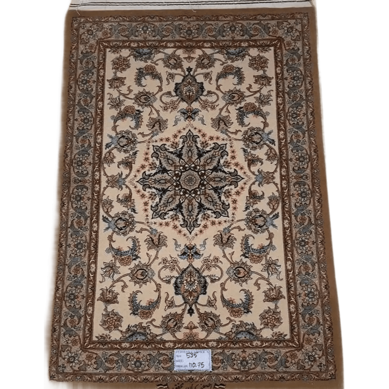 "Hand-knotted Persian Mohaghegh rug – 110x75 cm, crafted with wool and silk, featuring intricate designs and 810,000 knots per square meter, adding timeless elegance to any space."