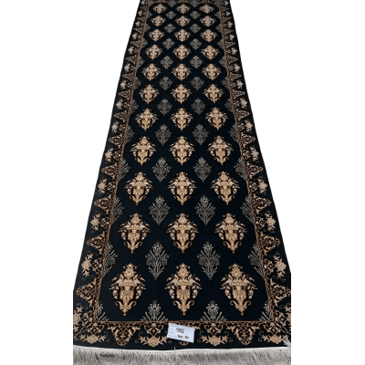 "Hand-knotted black Persian runner rug from Isfahan, featuring a blend of wool and silk, with intricate jewel-toned patterns. Dimensions: 300 cm x 80 cm."

