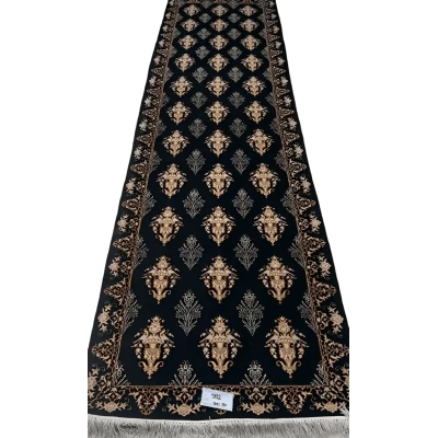 "Hand-knotted black Persian runner rug from Isfahan, featuring a blend of wool and silk, with intricate jewel-toned patterns. Dimensions: 300 cm x 80 cm."

