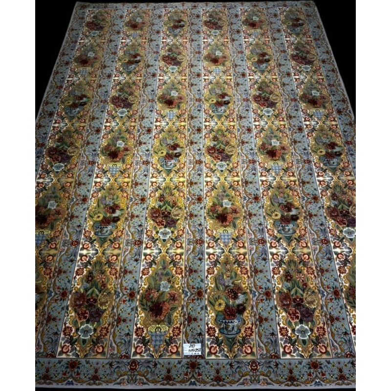 "High-density knotted Persian carpet from Iran, with vibrant floral designs and luxurious silk warp."