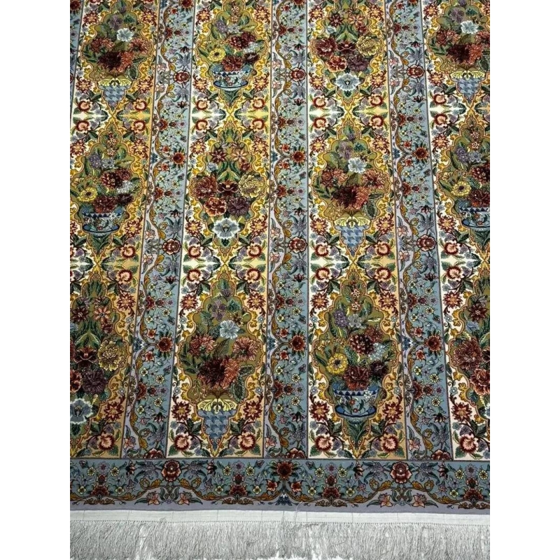 "Traditional Persian rug, silk and wool pile, hand-knotted for 1,000,000 knots per square meter."